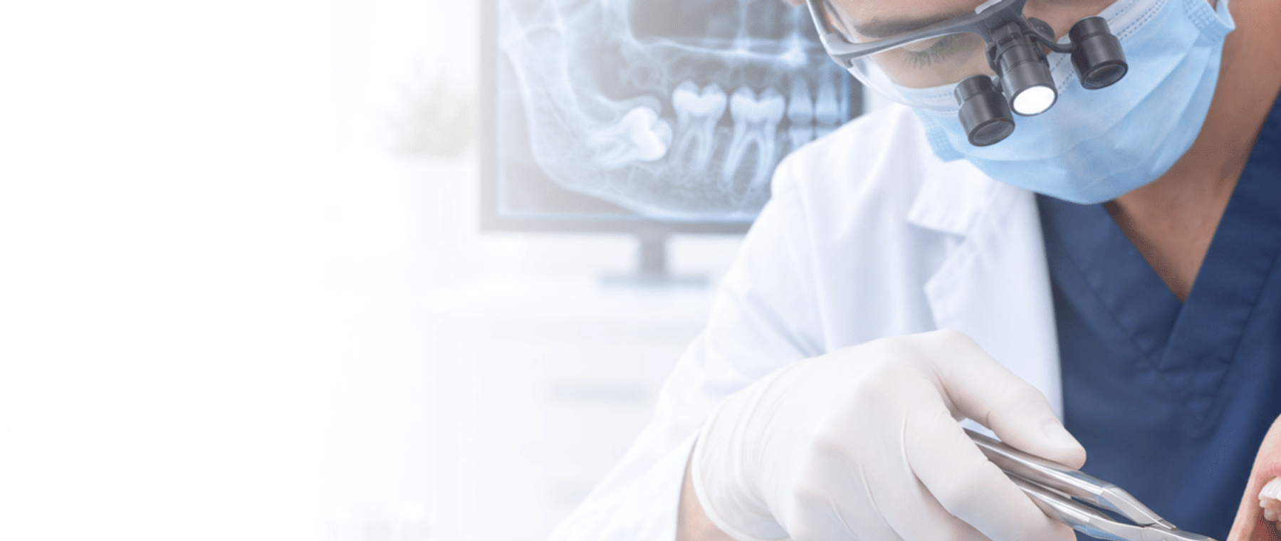 Dentist assessing an impacted third molar before wisdom tooth removal in Karachi at DentoCorrect PECHS