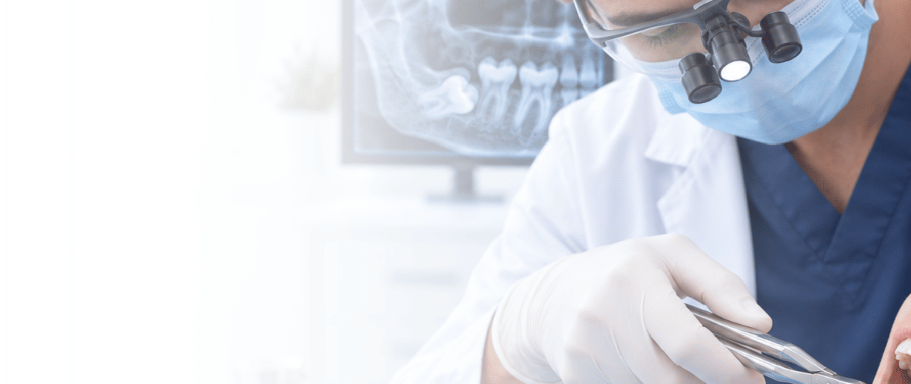 Dentist assessing an impacted third molar before wisdom tooth removal in Karachi at DentoCorrect PECHS