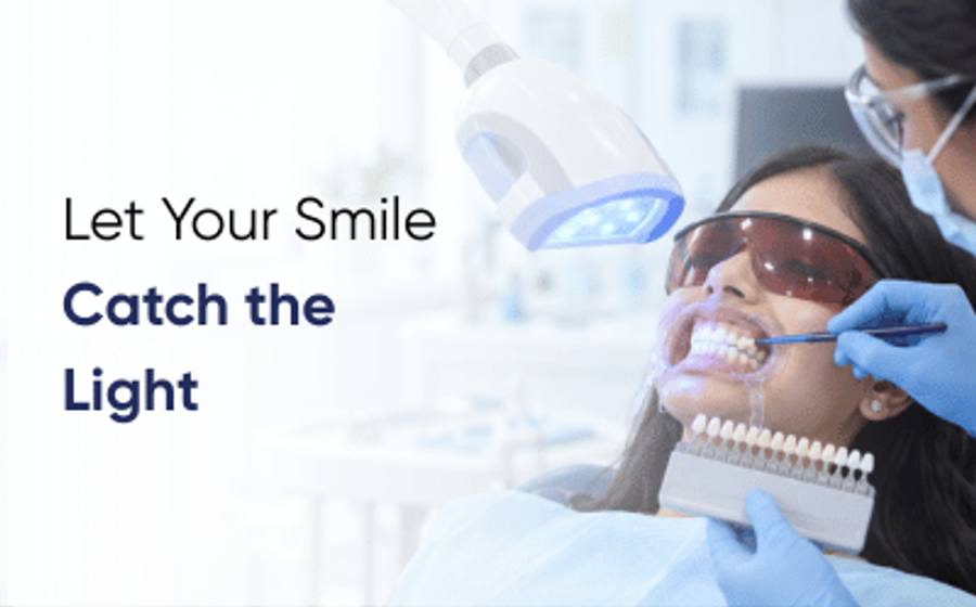 Teeth whitening in Karachi: patient having professional in-clinic whitening with a shade guide held up