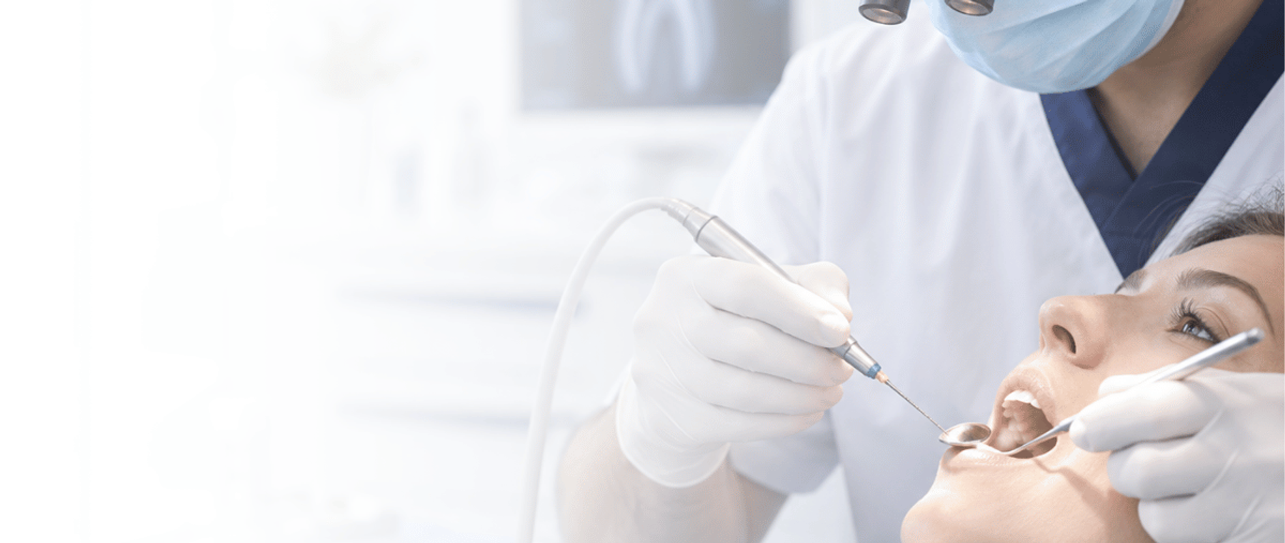 Dentist performing root canal treatment in Islamabad at DentoCorrect F-8 Markaz