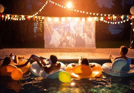 Dive in cinema at home, sitting on pool floats