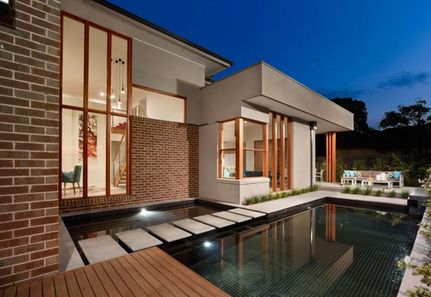 Pool spa and house with dining area landscape design in Camberwell Melbourne