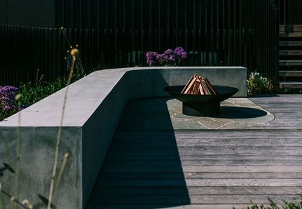  Fire pit concrete curved seating area around landscape architecture and garden design by Mint in Smiths Beach Victoria