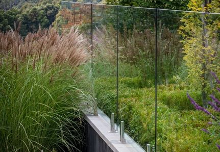 Pool fence and grasses and lavender plantings overlooking Macedon Ranges in Mint Design luxury country estate project