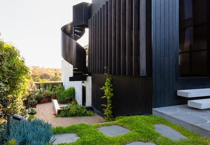 Jan Juc project landscape design featuring spiral staircase at side of house