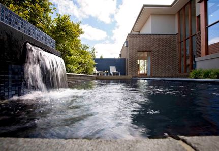 Water Feature and dark pool backyard landscape design in Camberwell Melbourne