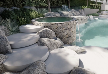 Pool with boulders and concrete steps