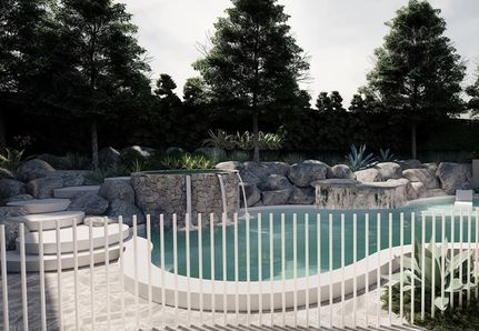 Rounded edge modern pool design with raised spa and steppers into pool