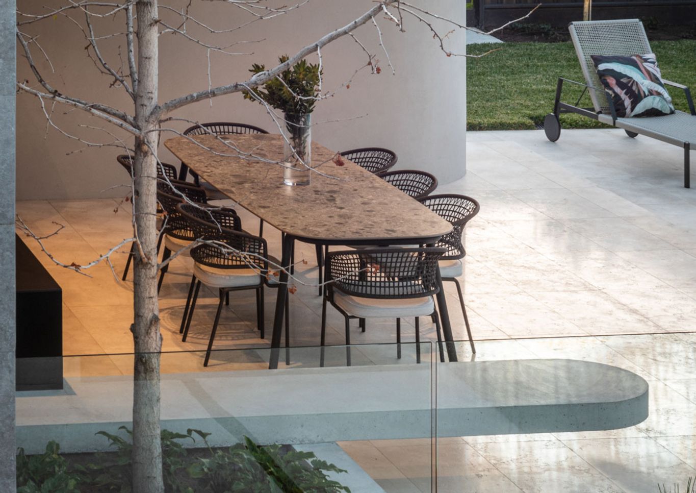 Alfresco dining area looking back to the pool and spa in Williamstown landscape design project