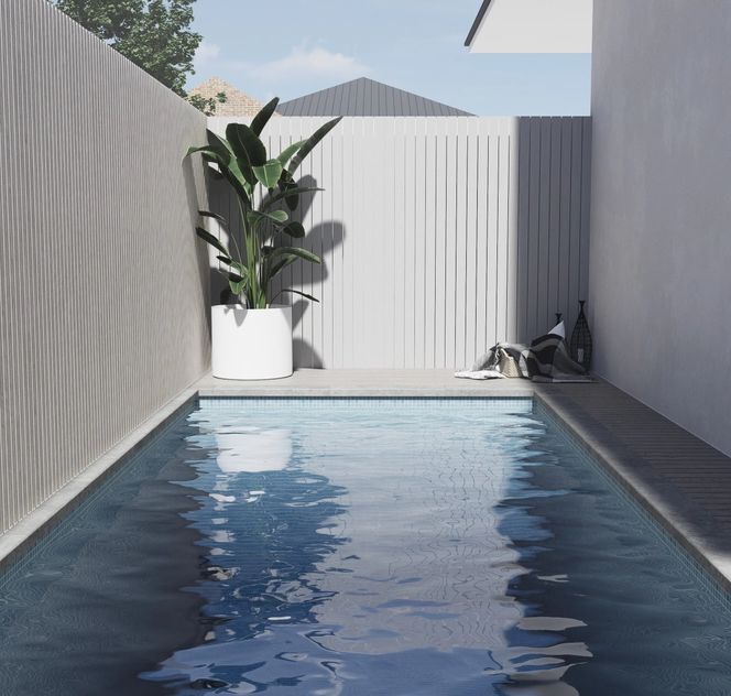 Modern pool using the side of the house for maximum space