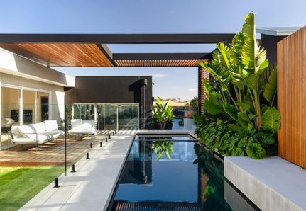 Modern Rectangular pool design by Mint Design