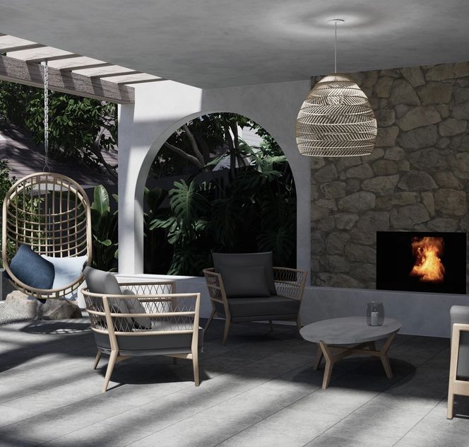 European inspired Greek alfresco area with stone feature wall and outdoor fireplace