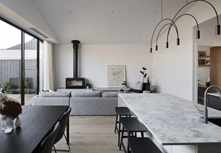 Loungeroom and dining and kitchen  at Parkview House in Thornbury by Allie Harris and Mint Design