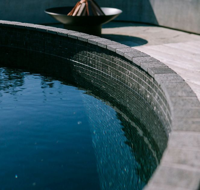 Landscaper design and architecture of pool and firepit in Melbourne