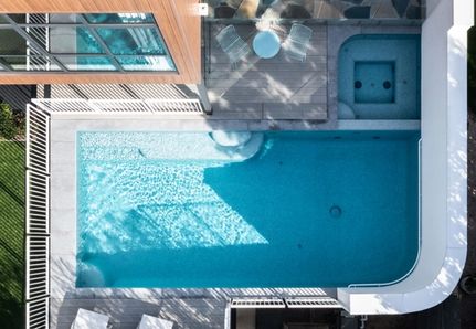Curved wall pool drone aerial shot