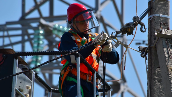 Linesman working on a utility pole