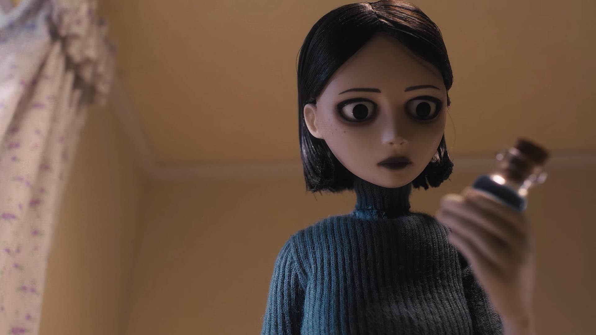 Stop-motion woman with a black bob and large dark eyes examines a small bottle in her hand.