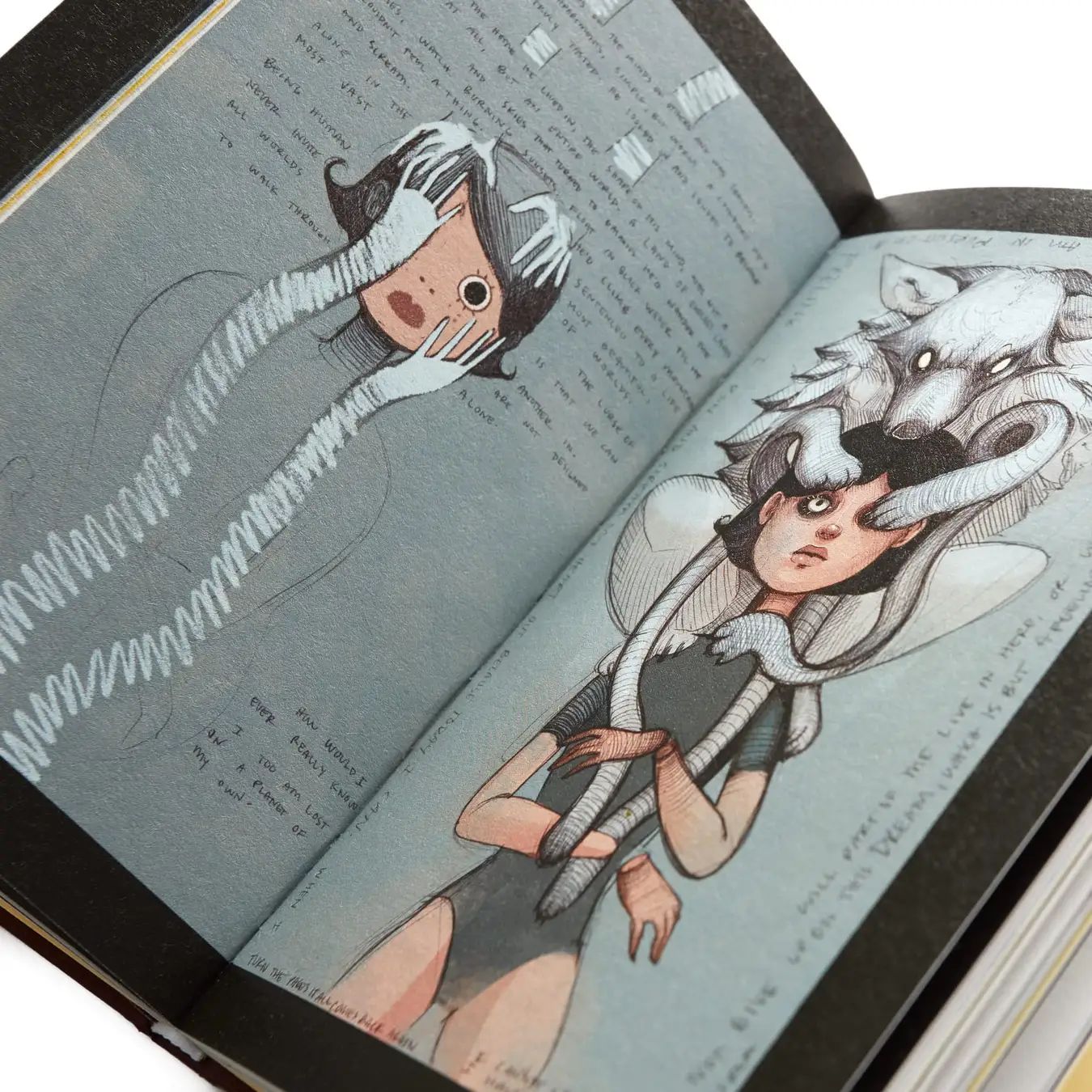 Open sketchbook with stylized drawings of a woman covering her face and a horned creature looming over another woman