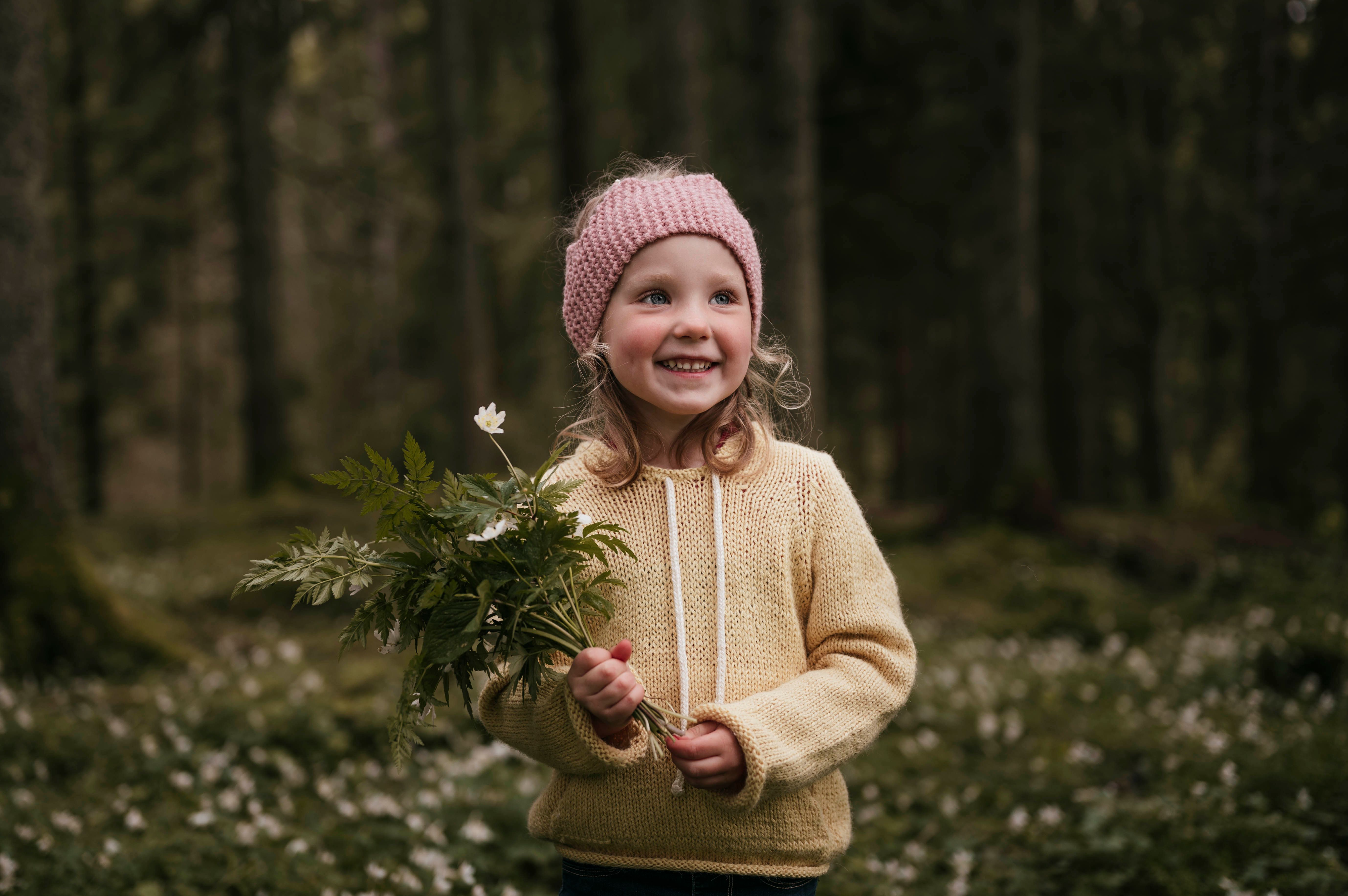 Nydelig jente fotografert i hvitveisenga