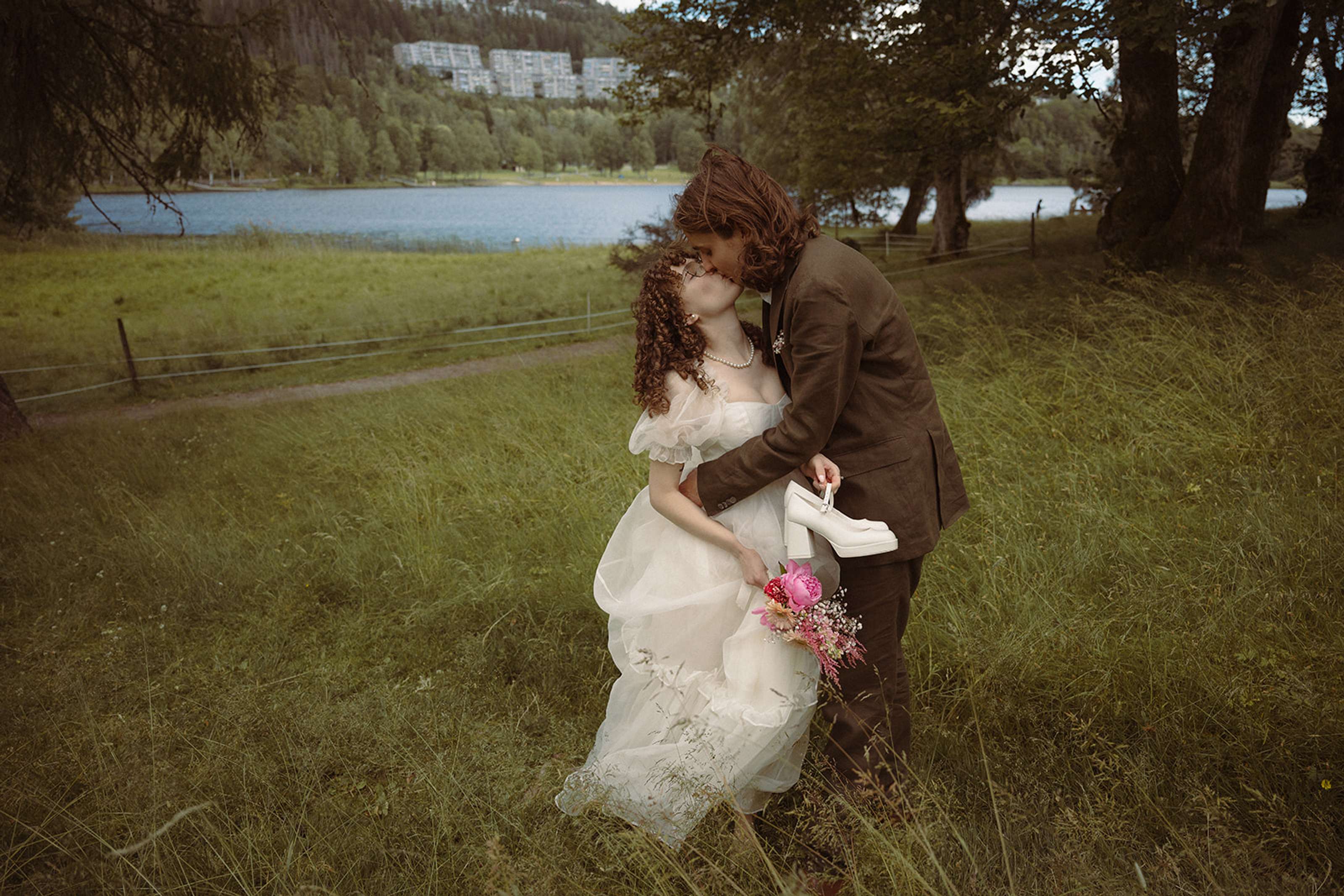Kissing in a field