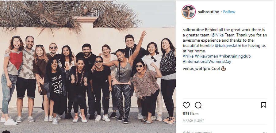 Instagram photo of an influencer posing with Nike employees