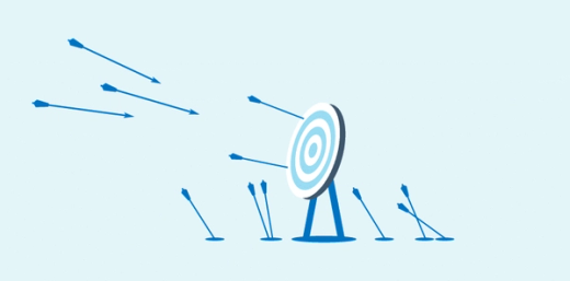 a target with arrows flying towards it