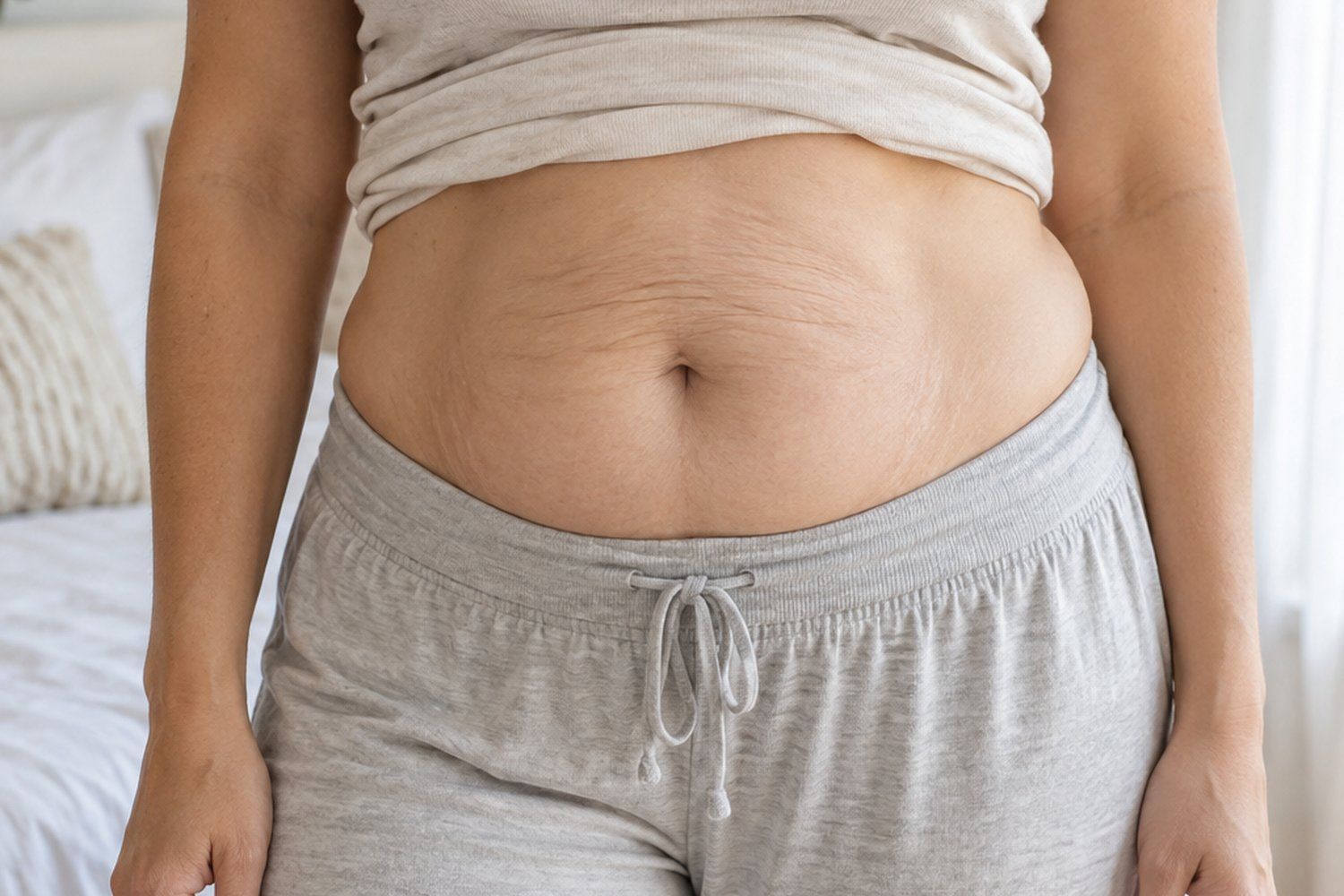 Why do I still look pregnant after giving birth?