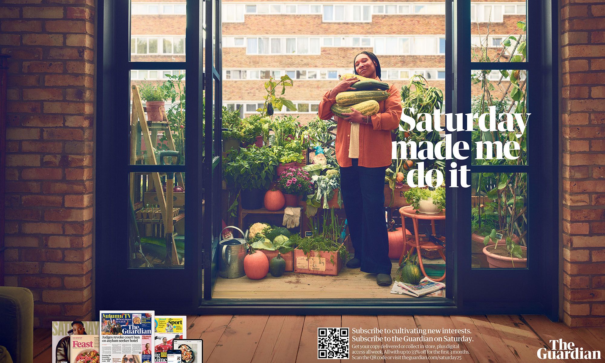 A woman in a red jacket and black trousers stands in a garden, holding a large basket of fresh vegetables.