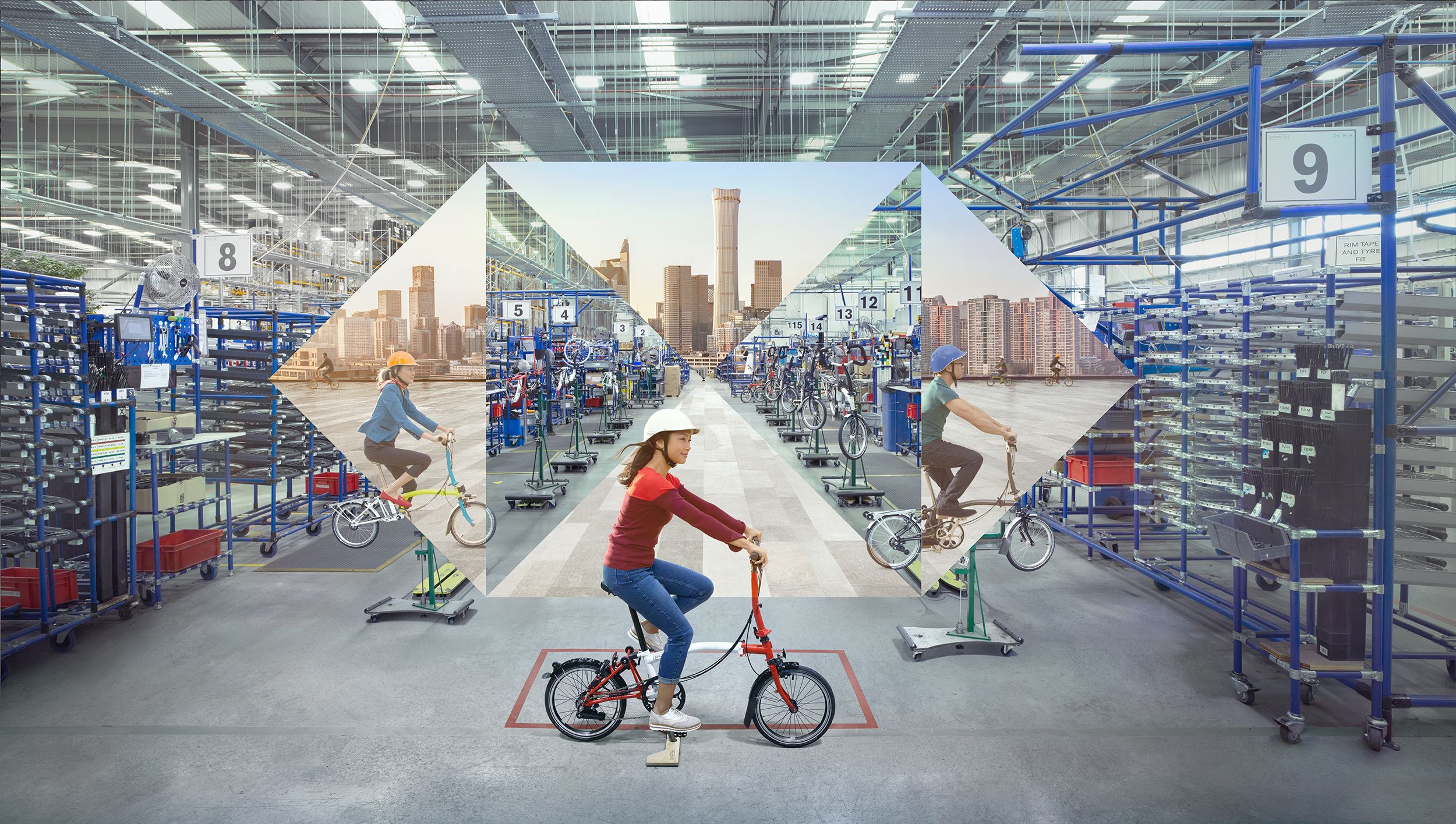 A woman in a red shirt and blue jeans riding a red bicycle in a warehouse with blue shelving and a city skyline in the background.