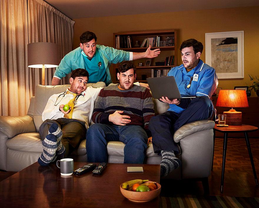 Four men sitting on a couch in a living room, wearing different types of clothing.
