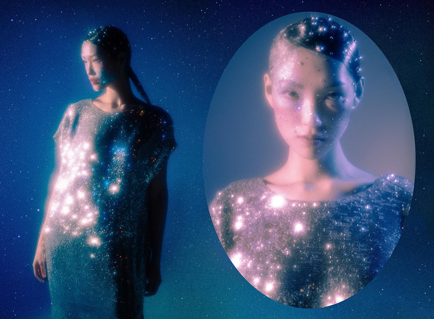 A woman in a sparkly, galaxy-inspired dress, surrounded by a starry night sky.
