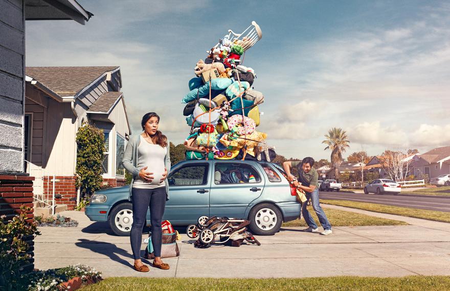 A woman and a man are loading a car with numerous household items in what appears to be a chaotic scene.