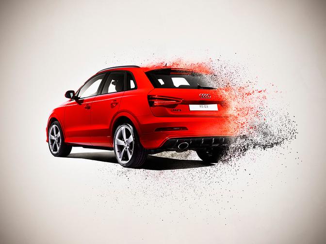 A red Audi car is exploding in a cloud of smoke and flames, with debris flying everywhere.