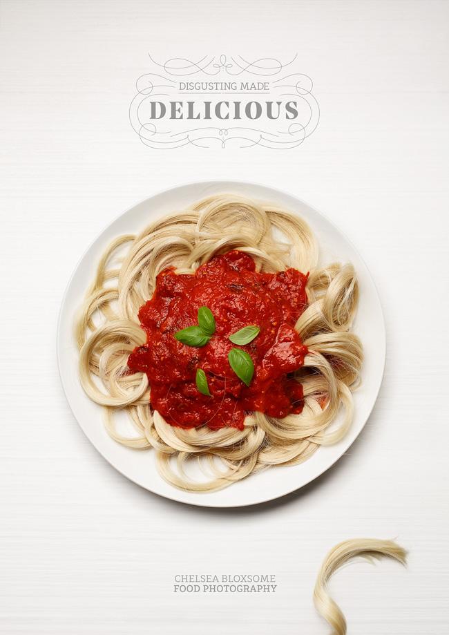 A plate of spaghetti with a rich, red tomato sauce and a sprinkle of fresh basil leaves, served on a white plate.