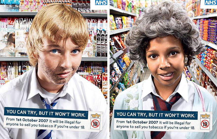Two people in a supermarket with a sign about the new tobacco sales law for minors.
