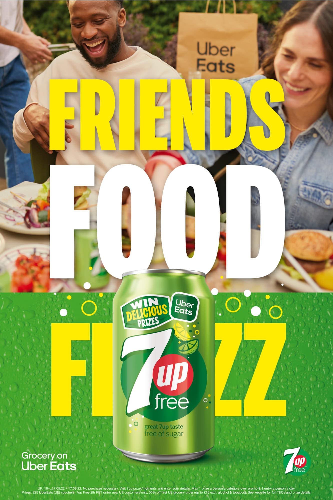 A foodie friend's dream: an image of people laughing and eating, with a green background and a green 7-Up can in the foreground, hinting at a fun and satisfying experience.