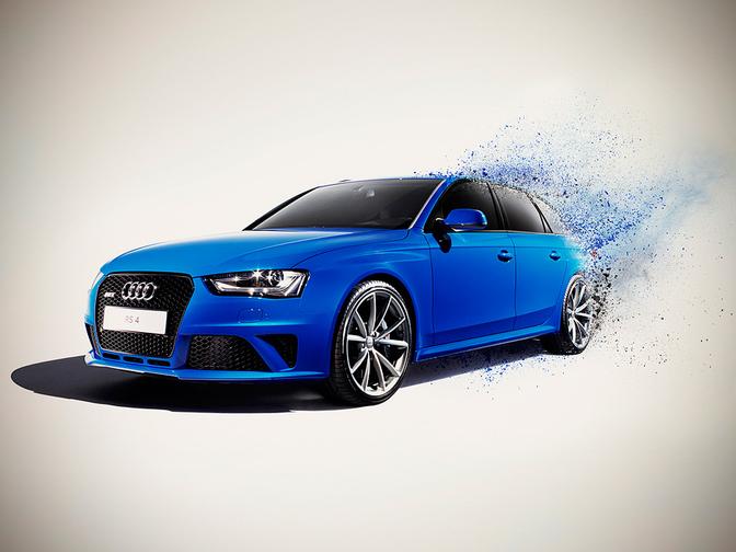 A blue Audi RS 4 car is exploding in a cloud of blue smoke.