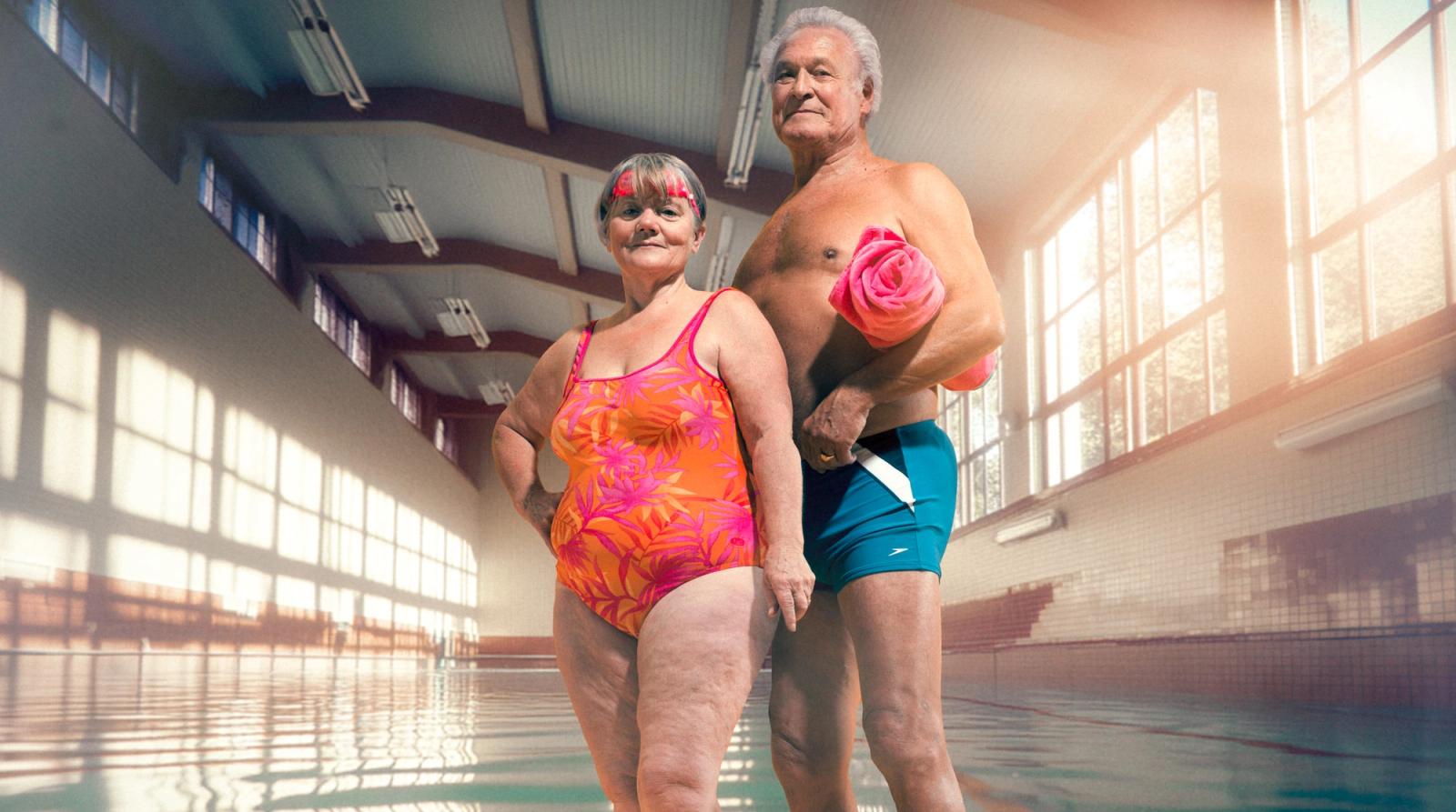 gary-salter-older-man-and-woman-standing-swimming-pool-wearing - AI generated hybrid HQ.jpg