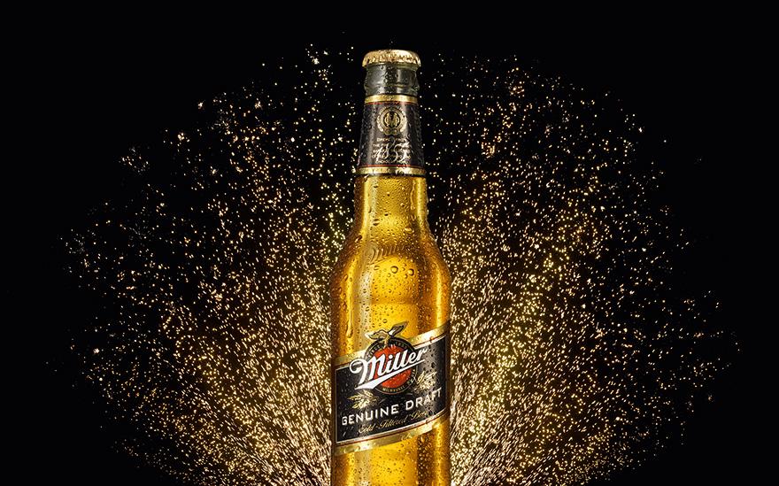 A bottle of Miller Genuine Draft beer.