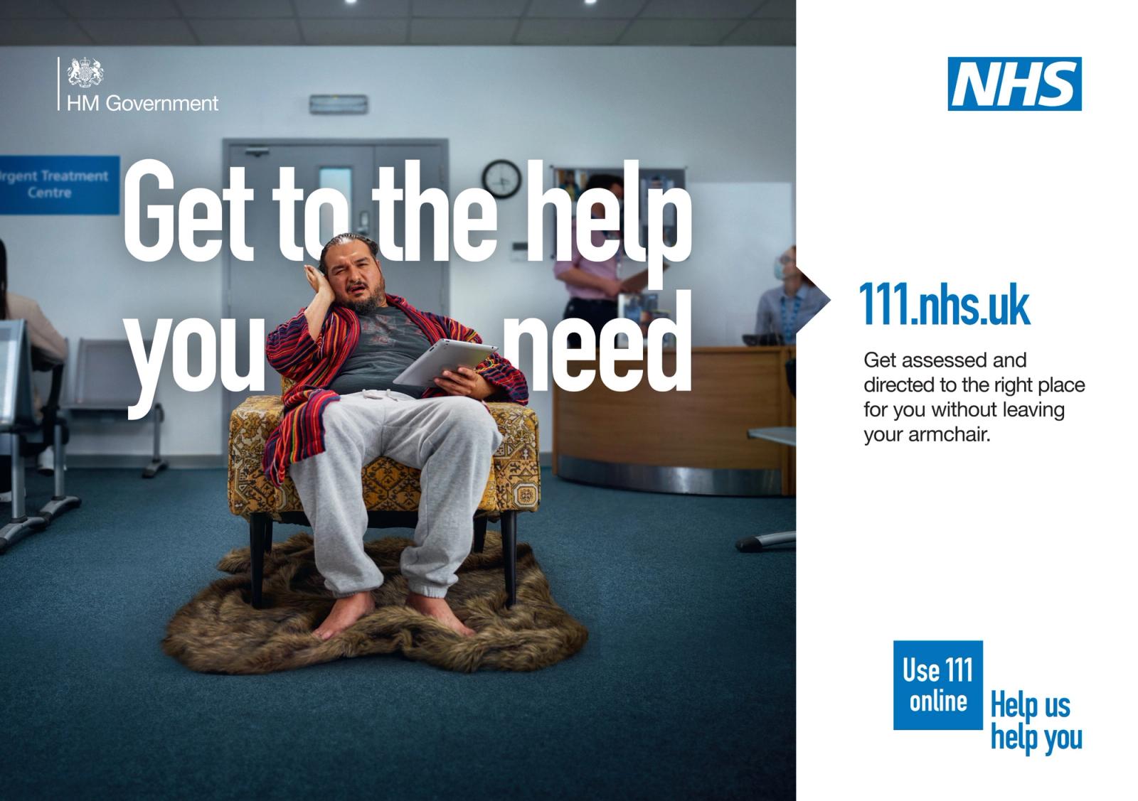 A man in a hospital waiting room, wearing a hospital gown, sitting on a chair, holding a tablet, with a hospital sign in the background.
