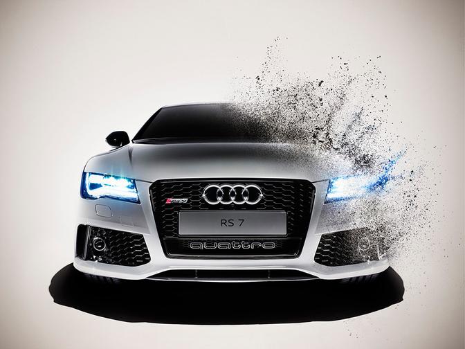 A white Audi RS7 is exploding in a cloud of smoke and debris.