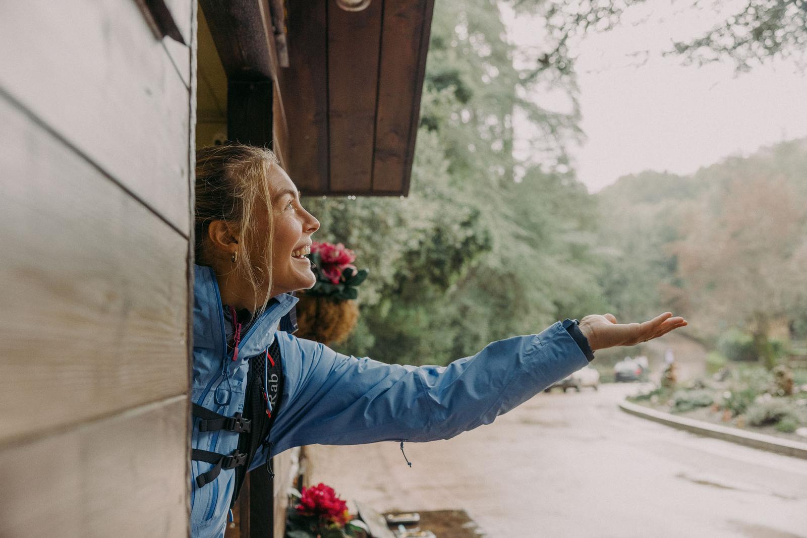 James Bowden girl in rain in log cabin