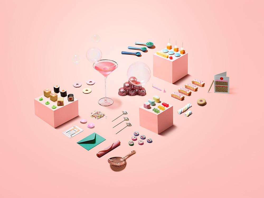 A still life of various sweet treats, including cupcakes, cookies, and candy, arranged on a colorful background.