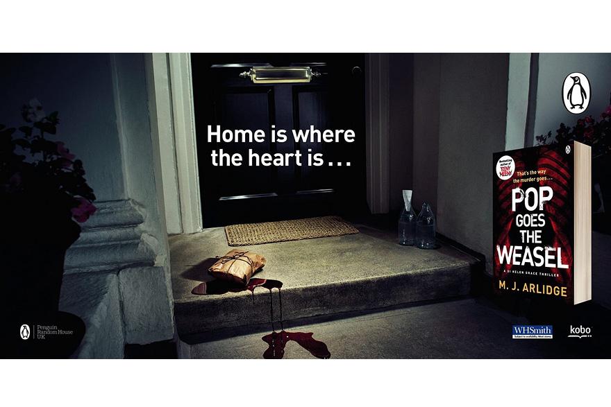A dark image shows a door with a bloody handprint, a book titled 'Pop Goes The Weasel,' red liquid on the steps, and another book on the ground.