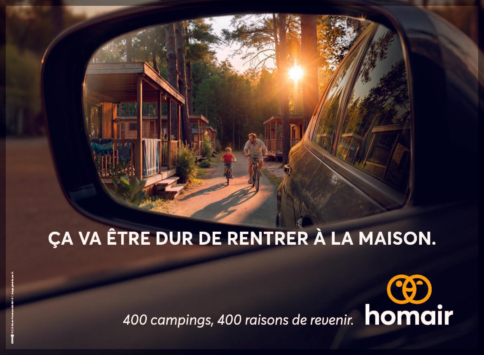 Alys Thomas Camping Homair 3 looking at family camping scene dad and son riding bike through car mirror