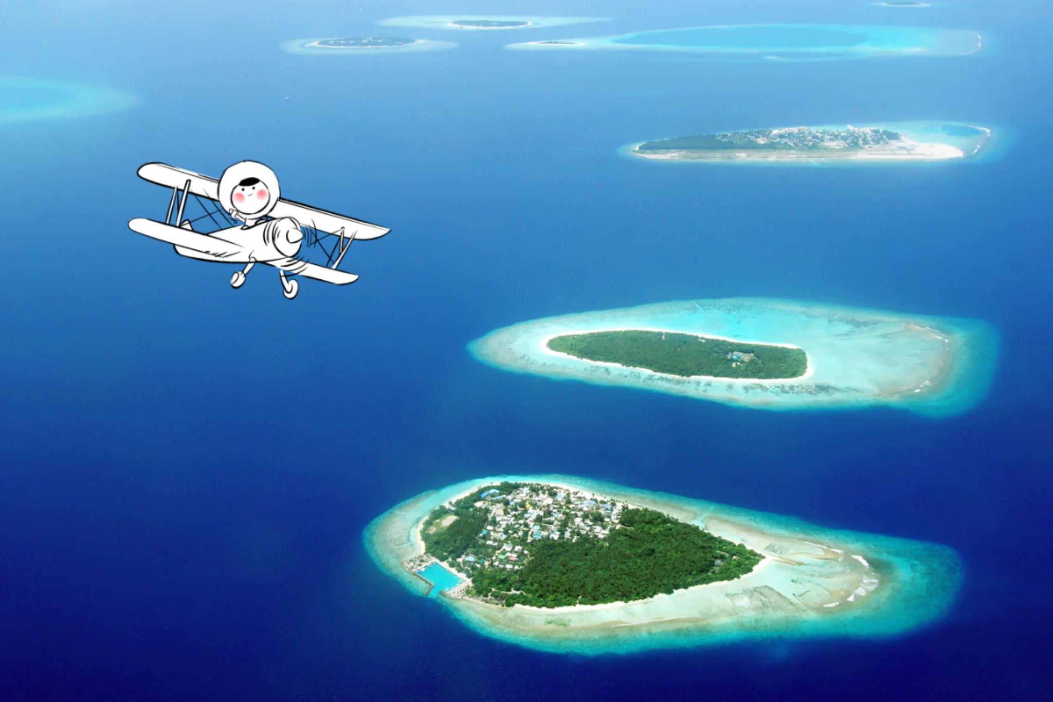 Aerial view of the Gili Islands showing small tropical islands surrounded by turquoise lagoons and deep blue ocean, with reefs clearly visible beneath the water.