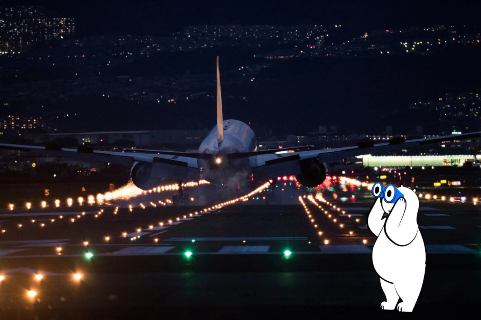 An overnight flight, often called a red-eye flight, preparing for departure on an illuminated runway at night.