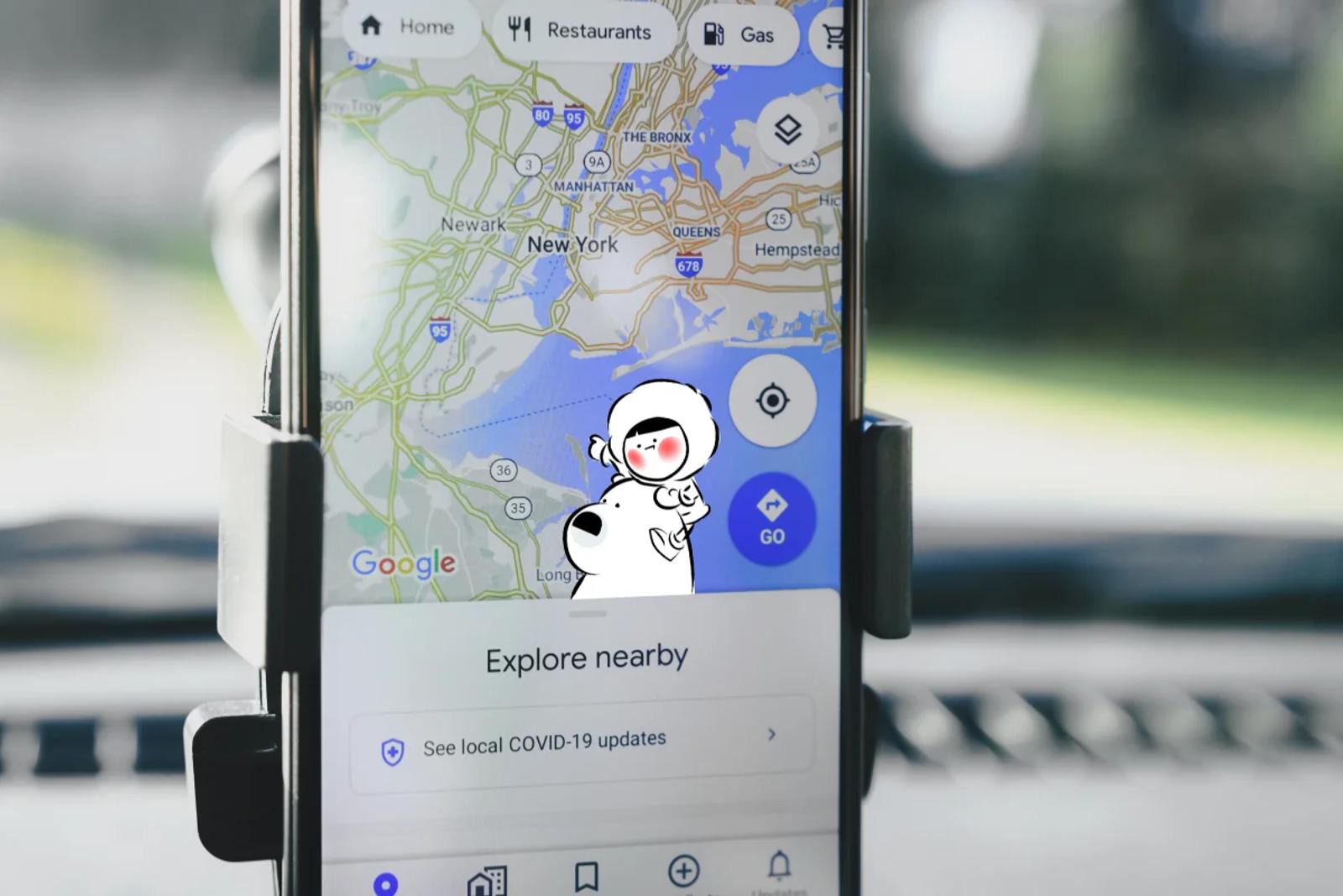 A smartphone mounted in a car displaying Google Maps navigation, representing Google Live Map’s real-time traffic and navigation features.
