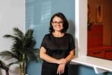 A Valley Audiology & Hearing Center audiologist standing in a bright office