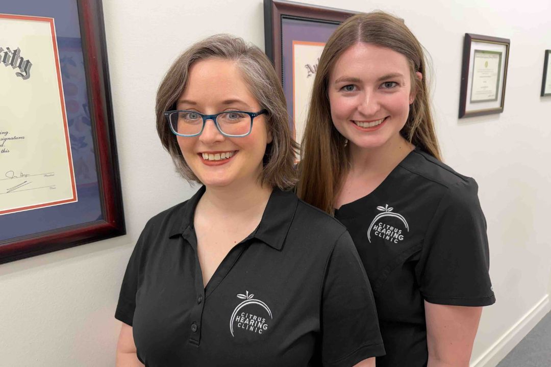 The two audiologists of Citrus Hearing Clinic smiling in their office